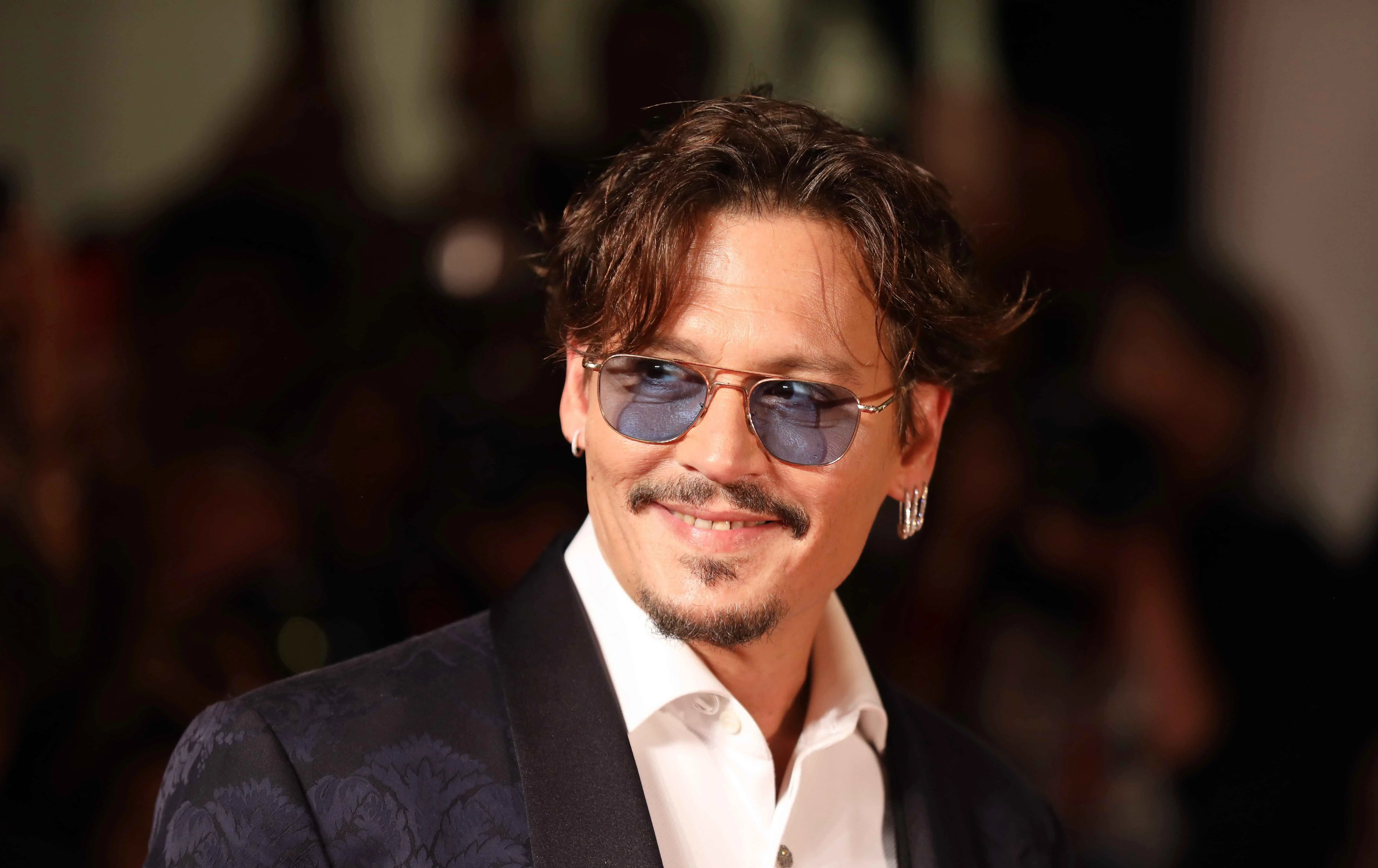 “Johnny Depp’s Landmark Dior Fragrance Endorsement Deal: An Inside Look”